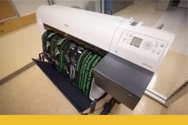 Large format printer halfway through printing a large poster