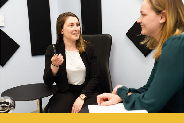 Student and faculty member discuss graduate programs