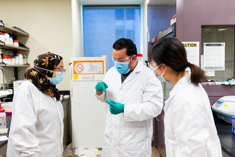 Students work together on a Chemistry experiment in a lab at Chernoff Hall