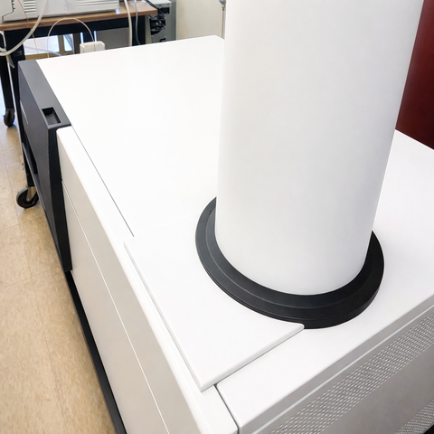 Photo: Agilent LC-QTOF System. Laboratory photograph of an Agilent 1260 Infinity II Liquid Chromatography stack next to an Agilent 6545XT Q-TOF mass spectrometer.