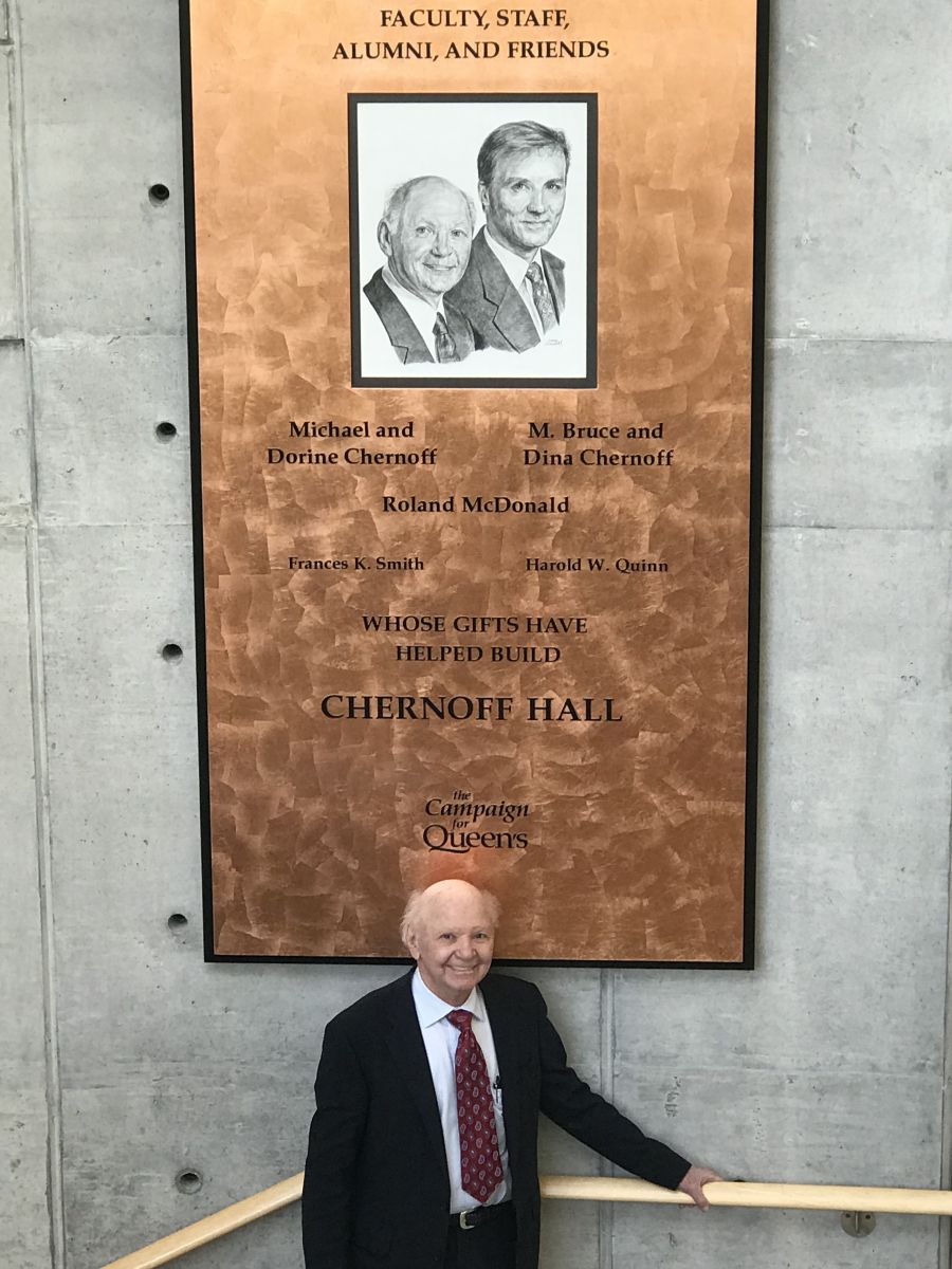 Photo: Mike Chernoff stands in front of his sign of Chernoff Hall