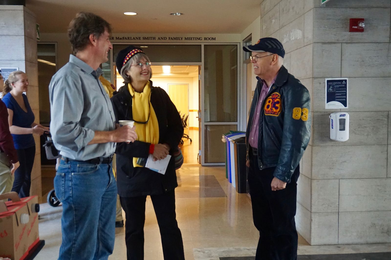 Photo: Dr. Loock chats with alumni